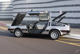 Illustration for article titled For $25,000, This 1981 DeLorean Could Be Your Coke Classic